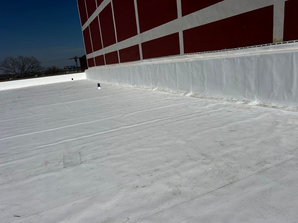 Gallery photos for Old Tar Roof Gone - Fresh TPO Flat Roof Installed: Image #1