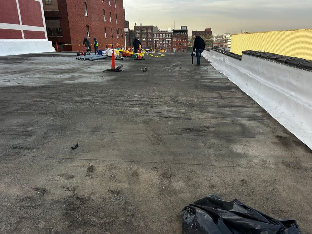 Gallery photos for Old Tar Roof Gone - Fresh TPO Flat Roof Installed: Image #3